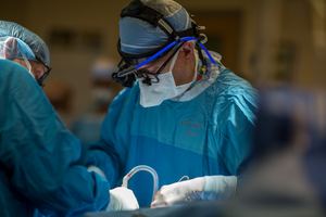 Dr. Richard Whitlock preforming heart surgery