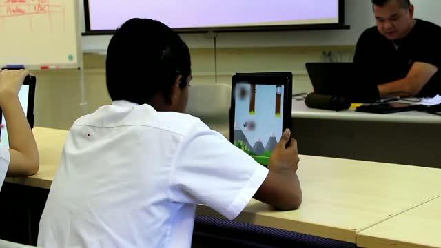 Students at APSN Tanglin School using the applications.