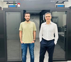 Postdoctoral researcher Dr. Aleix Noguera-Castells and study director Dr. Manel Esteller, in front of the Josep Carreras Institute's computer cluster where millions of epigenetic data points have been processed.