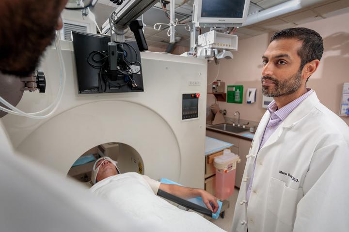 Goyal Overseeing a Brain Scan