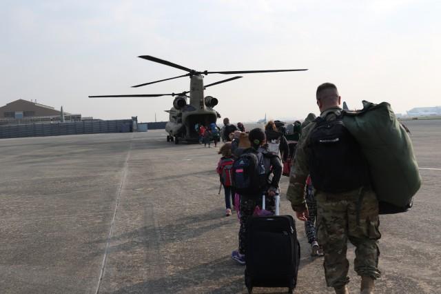 Family Members Board Army Helicopter