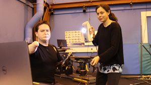 Quadruple amputee Alex Lewis with researchers at the University of Bath