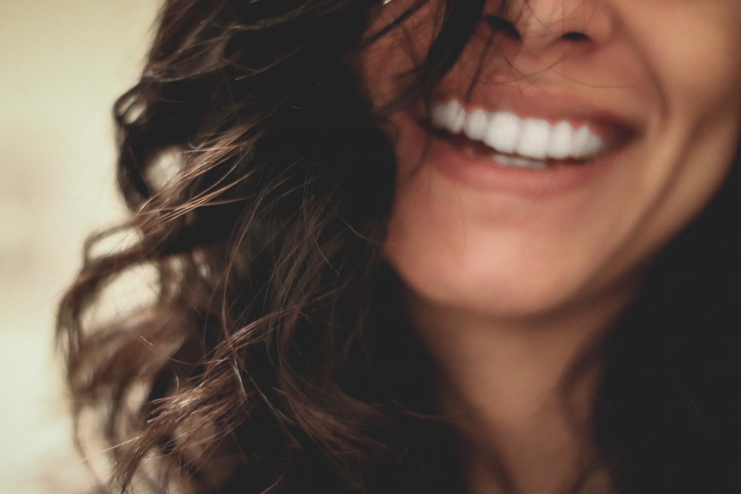 Woman Smiling Close-Up Photography