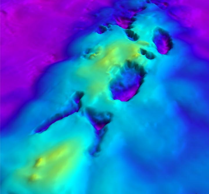 Kilometer-Scale Pockmarks Identified at the Ancient Seabed