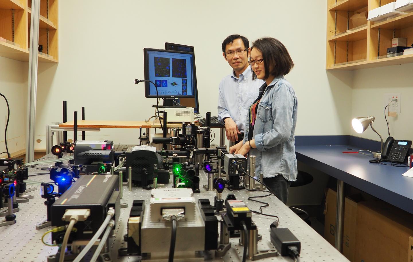 Keng Chou and Qian Liu at the Microscope