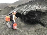 Mylène Jacquemart inspects a sediment-rich ice deposit