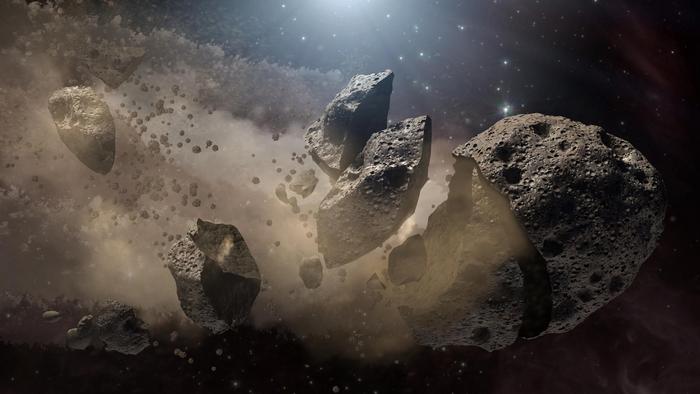 An asteroid is breaking up, producing a lot of dust, which reaches the Earth eventually.