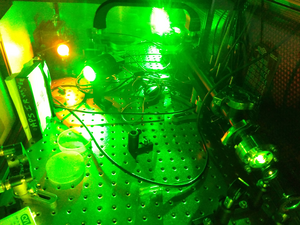 green laser converts to orange using ionic liquid