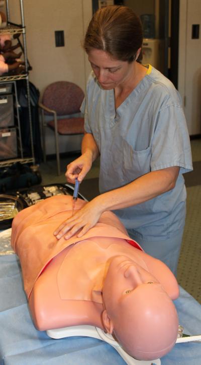 A Doctor Uses TraumaMan to Practice Emergency Procedures