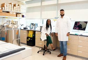 LJI scientists Annie Elong Ngono (left) and Rúbens Alves