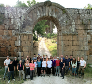 The international team of scholars and researchers at the ancient walls of Falerii Novi