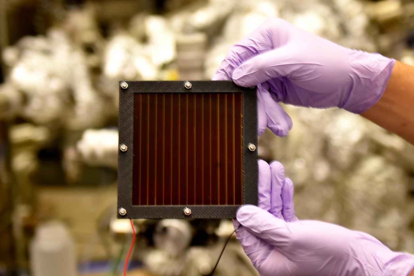 A 100 cm2 Perovskite Solar Module Consisting of Multiple Connected Solar Cells