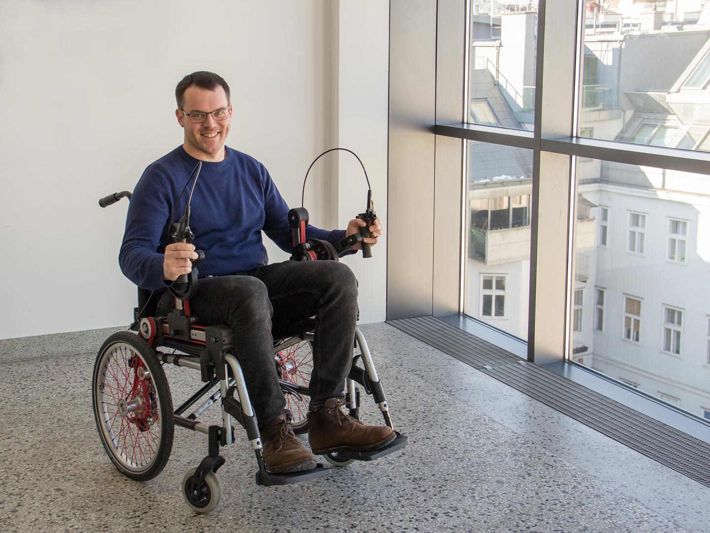 Markus Puchinger Demonstrating the New Wheelchair