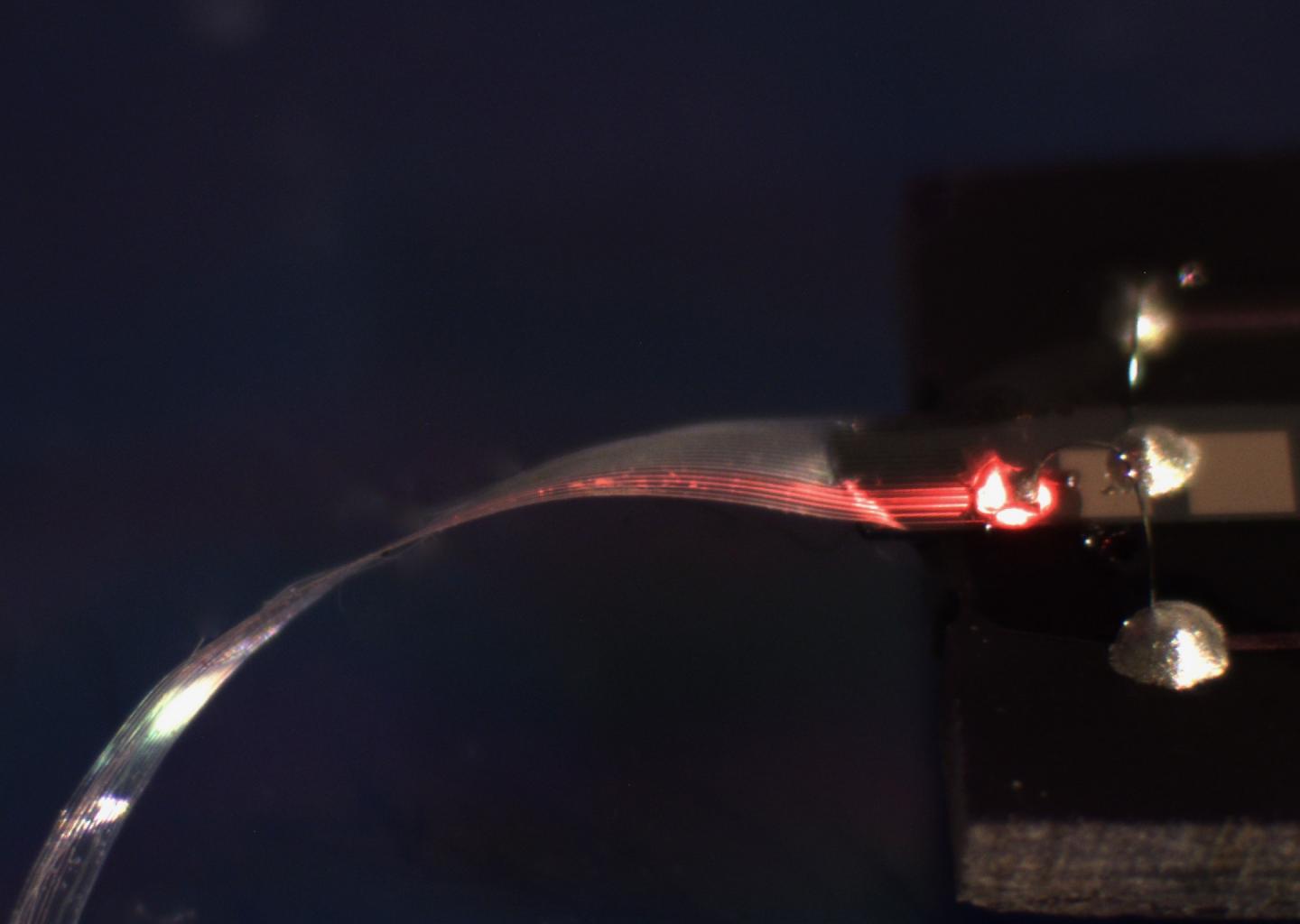 A Powered Waveguide Under Magnification