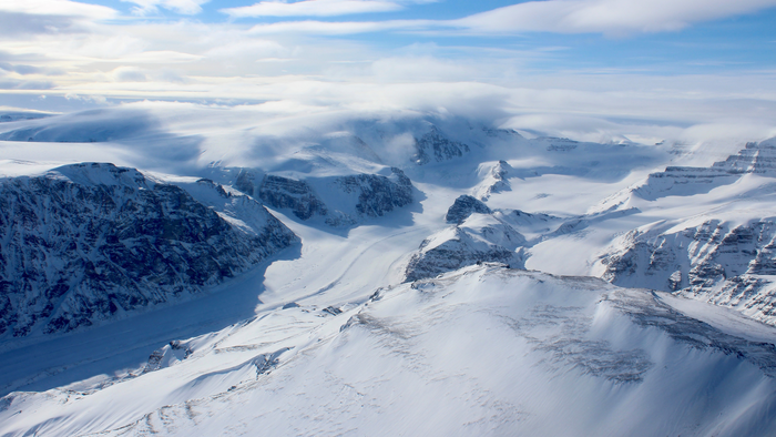 Ice capped and snow-covered mountains of coastal west Greenland. (Apr. 2015)