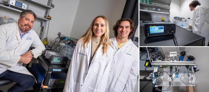 researchers in lab with equipment