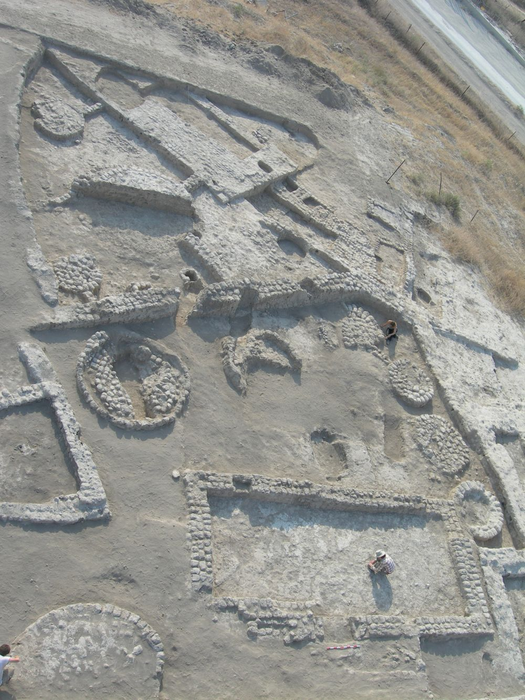 Buildings and rounded siloes at the village of Tel Tsaf