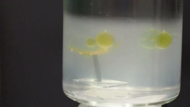 Video of a Tiny Plastic Underwater Robot that Moves by Magnetism and Light