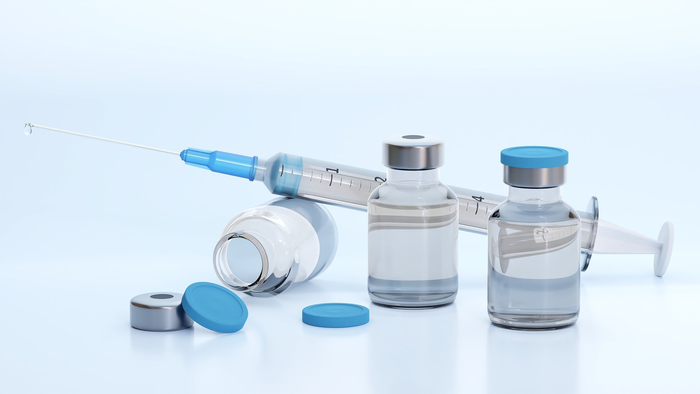 Image of a generic vaccine and injection.