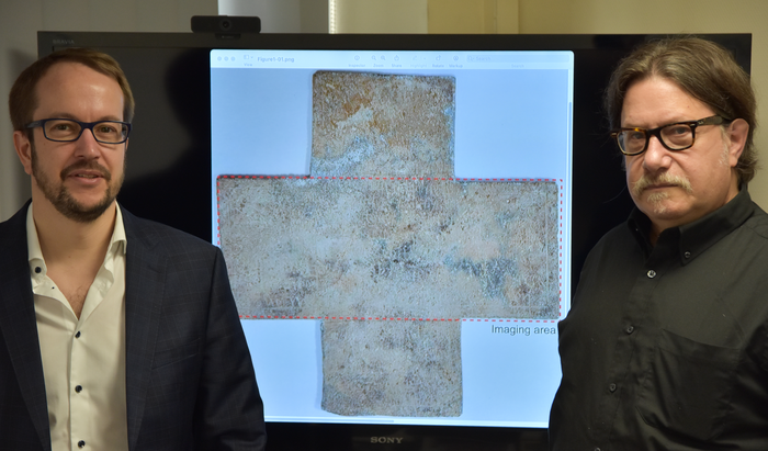 Professors David Citrin and Alexandre Locquet with funerary cross