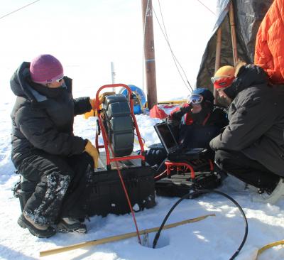 Lowering a Video Recorder into the Ice Bore