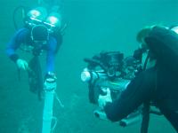 Divers Obtain Core Sample
