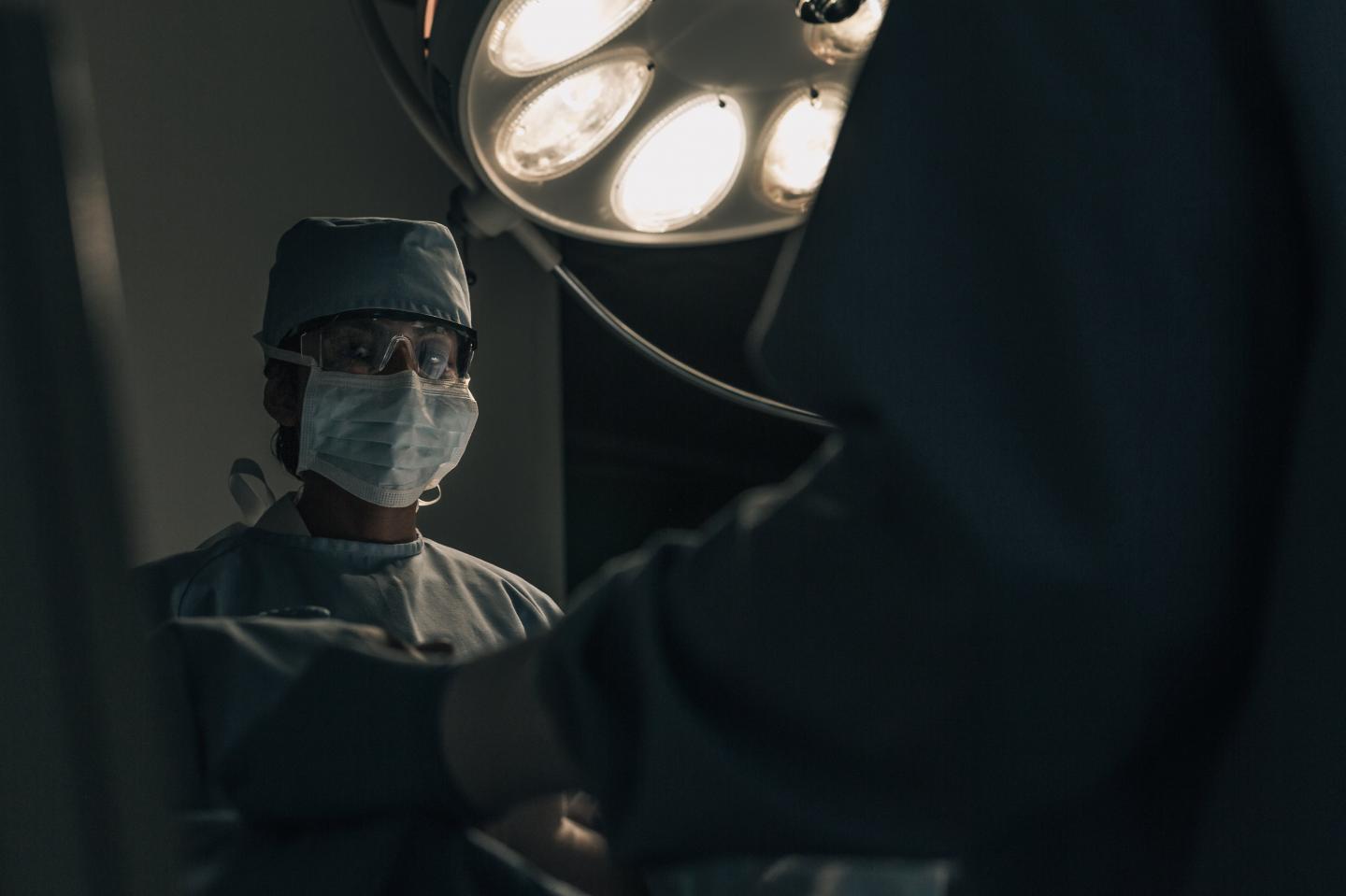 Surgeon Operating at Night