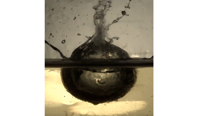 Explosion cavity which forms when a water droplet hits hot oil