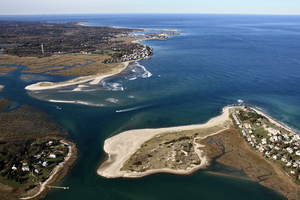 The meeting of the North and South Rivers (at left) and their shared inlet to the Atlantic Ocean, which formed in 1898.