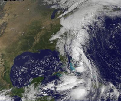 GOES-13 Sees Massive Low Over Eastern US and Nicole Remnants