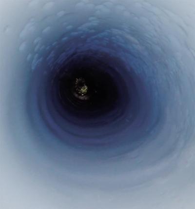 View down An Ultra-Clean Hot Water Borehole Drilled into Mercer Subglacial Lake