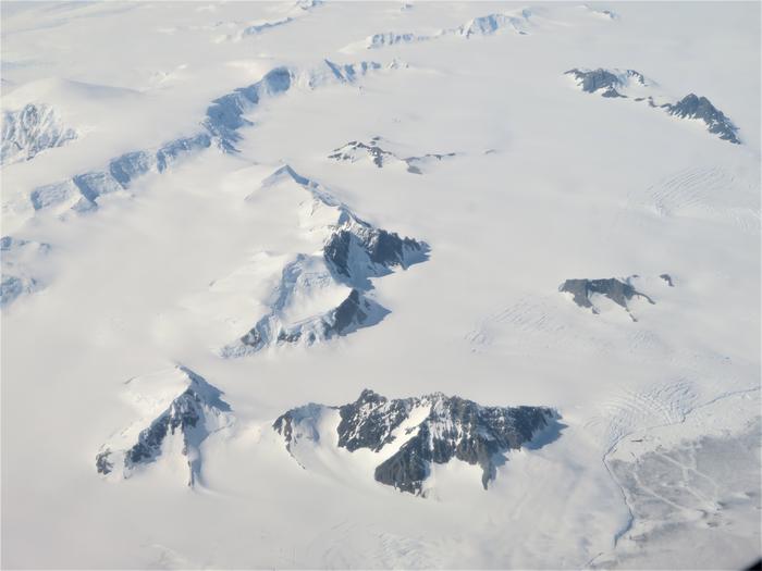 Mountains and glaciers of the Antarctic Peninsula from above