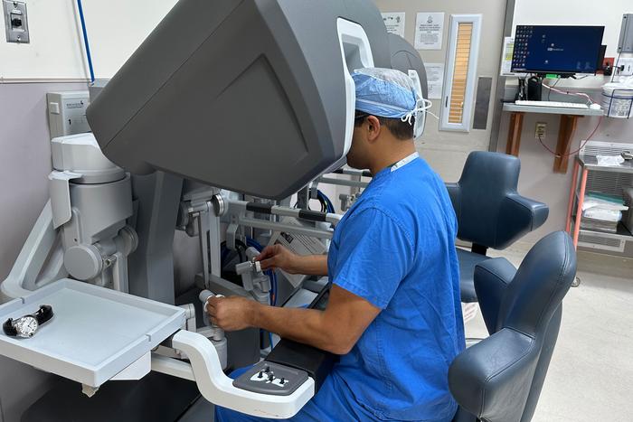 Khan using surgical robot