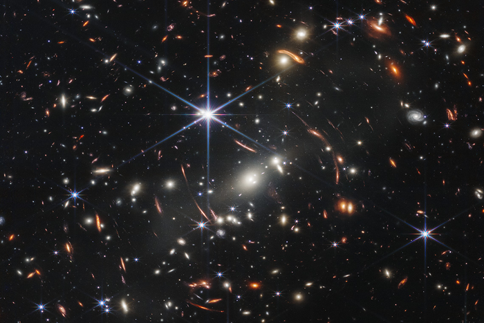 Thousands of galaxies flood this near-infrared, high-resolution image of galaxy cluster