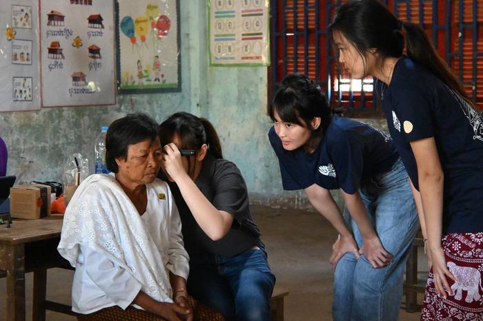 Students from Project Battambang and WS Audiology conduct an audiology assessment.