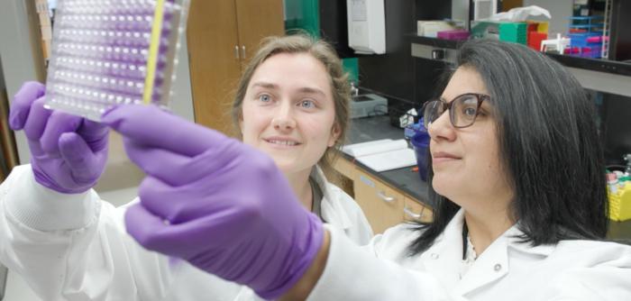 On right: Seema Lakdawala in her lab