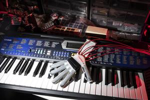 Robotic Glove Using AI to Play Piano