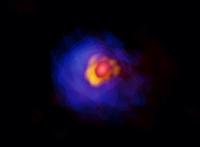 アルマ望遠鏡が撮影した、巨大原始星G353.273+0.641。