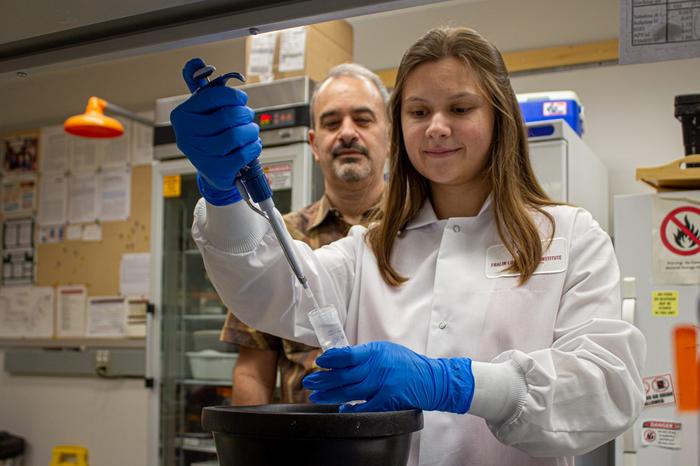 (From left) Daniel Capelluto and Marija Corluka, a Ph.D. student in biological sciences.