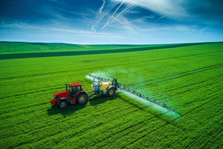 Tractor Spraying Crops