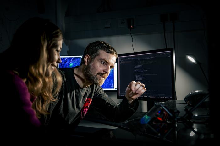 Olga Symonova and Tomas Vega-Zuniga at the in vivo imaging setup