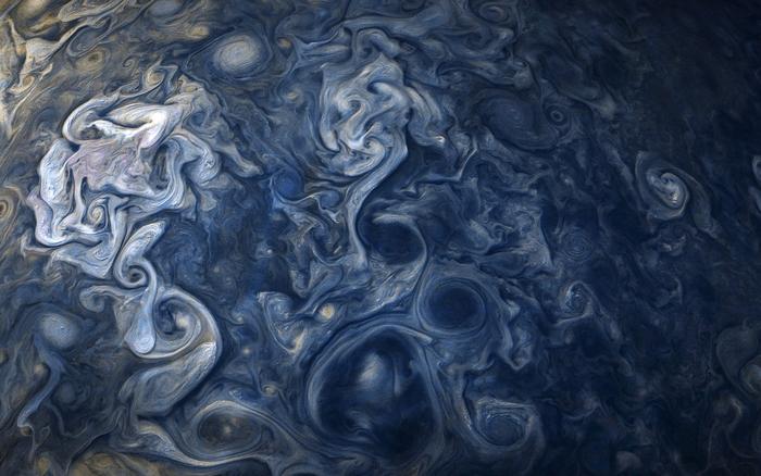 Cloud system in Jupiter's northern hemisphere imaged by Juno spacecraft.