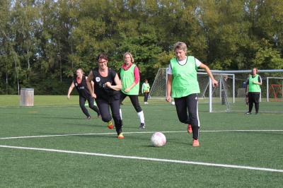 Mature Women Playing Football (1 of 2)