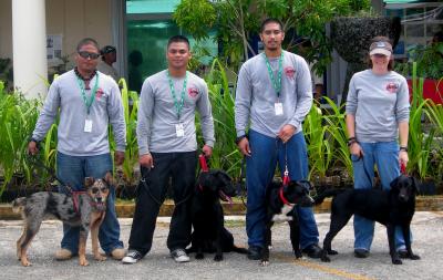 Dog Handlers with the Guam Coconut Rhinoceros Beetle Eradication Project