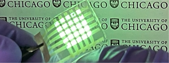 A flexible material can stretch, emit light and display a clear image