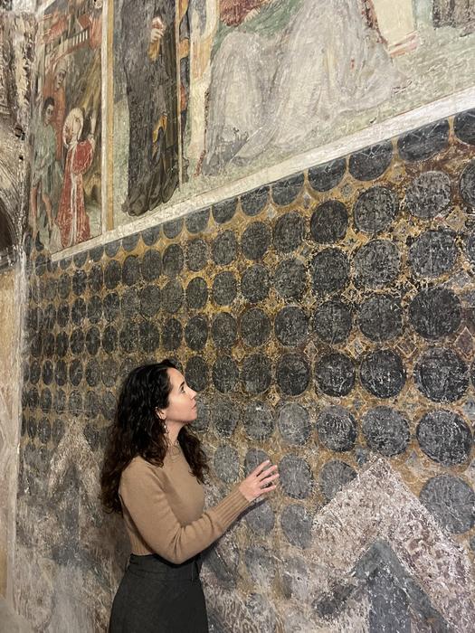 Dr Federica Gigante examining the fresco