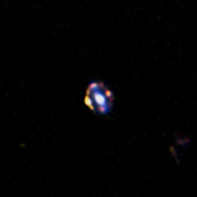 The Most Distant Gravitational Lens Yet Discovered
