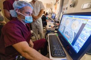 University of Iowa neurosurgeon Brian Dlouhy performs minimally invasive epilepsy surgery