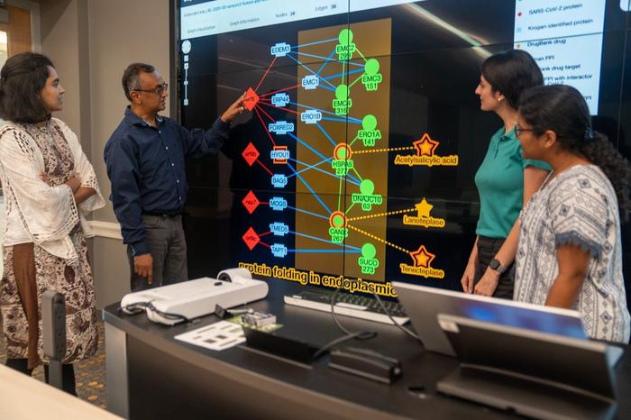 Computer science research team (from left) Nure Tasnina, T.M. Murali, Maryam Haghani, and Blessy Antony will help build predictive models based on machine learning to further research into pathogens that could jump species barriers and lead to infectious