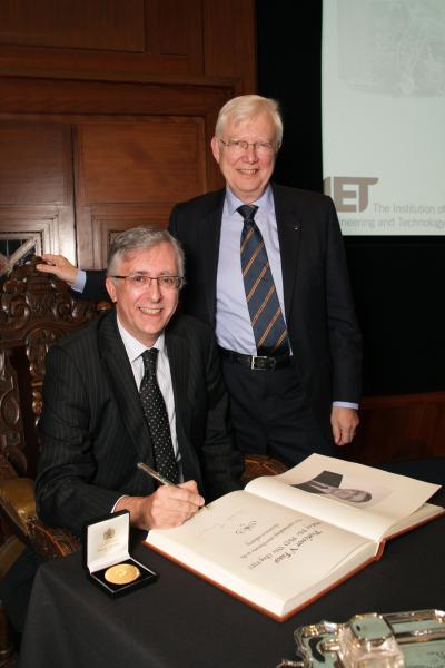 Professor Vincent Fusco Signing the Mountbatten Medallists Album